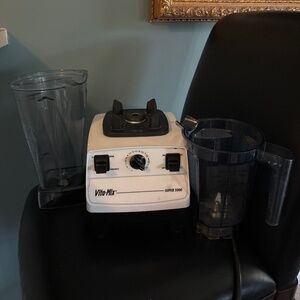 Vita-mix super 5000 with two canisters as shown unit works well no issues